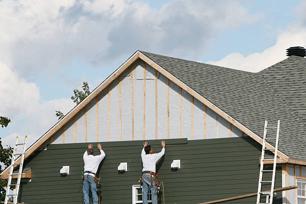 Professional Storm Damage Siding Repair technician working in Granville, PA